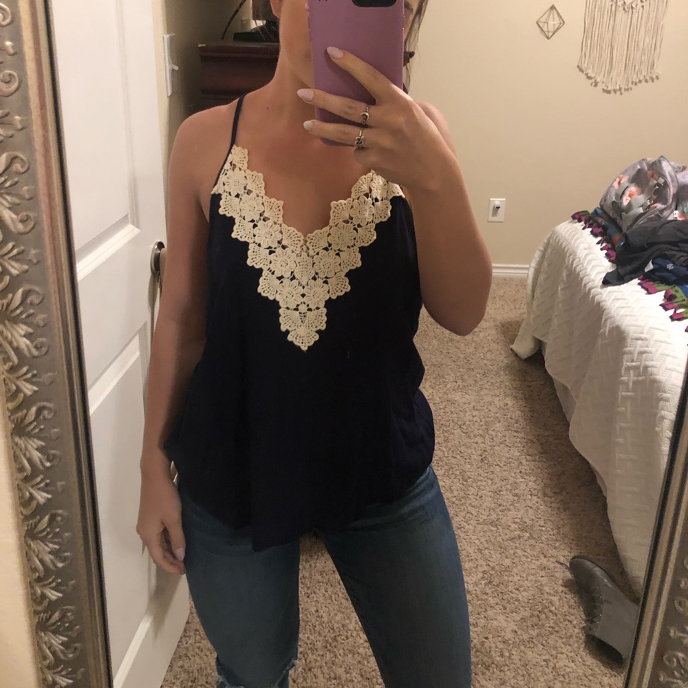 Francesca’s white lace navy blue tank